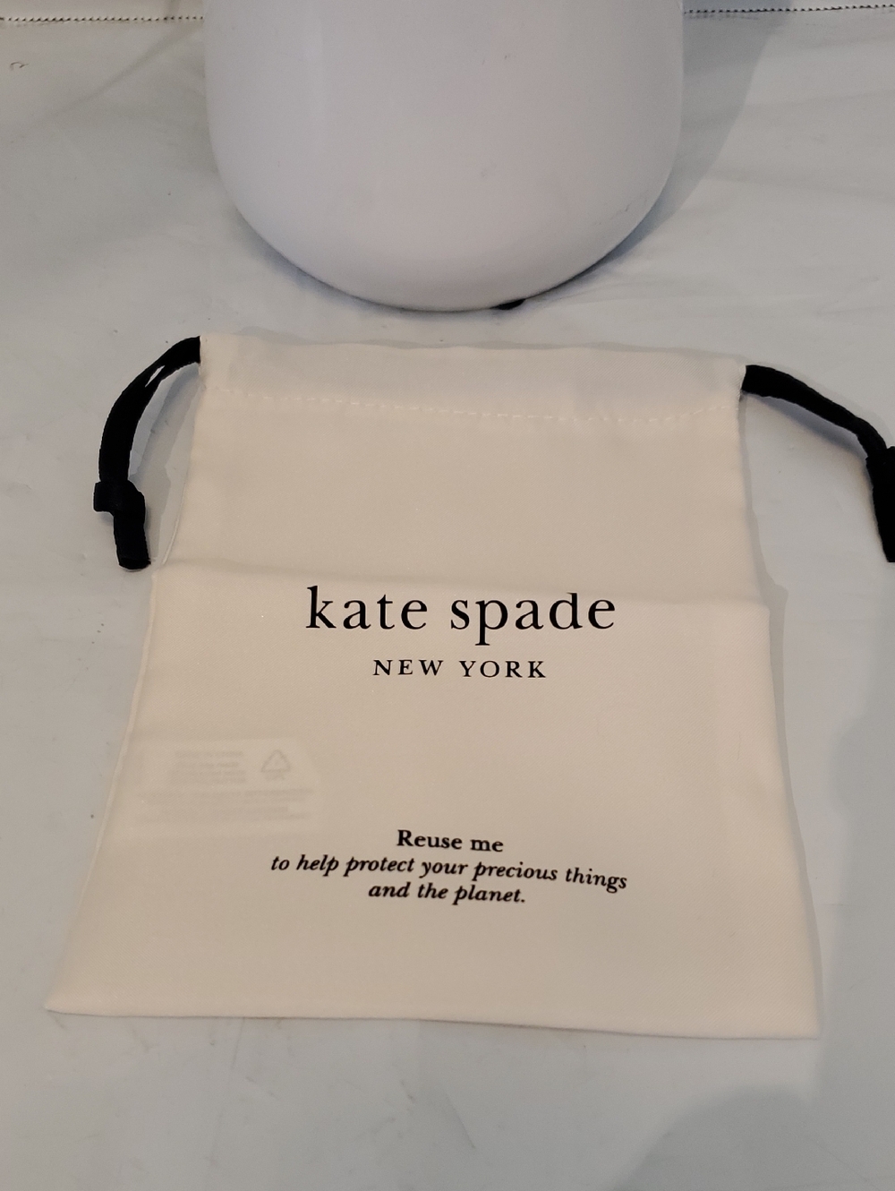 kate spade Cream and Black Drawstring Dust Pouch NWOT